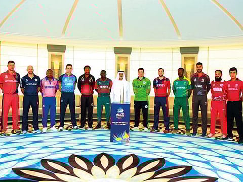 Captains of all 14 participating countries of the upcoming World T20 qualifiers pose with Shaikh Nahayan Mabarak Al Nahayan at the launch of the event. 