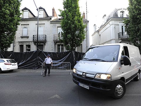Police in front of the Dupont de Ligonnes house in Nantes, Western France in 2011.