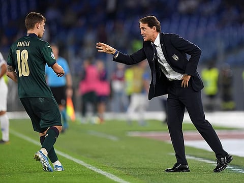 Roberto Mancini issues instructions during the win over Greece.