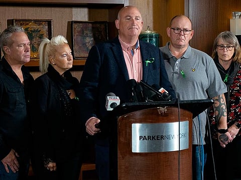 Radd Seiger, a spokesperson for the Dunn family, joins Charlotte Charles, center left, and Tim Dunn, center right, parents of Harry Dunn, who died after his motorbike was involved in an August 2019 accident in Britain with Anne Sacoolas, wife of an American diplomat, speaks at a news conference joined by Harry Dunn's step parents Bruce Charles and Tracey Dunn.