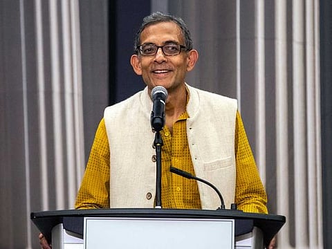 Abhijit Banerjee speaks during a news conference at Massachusetts Institute of Technology.
