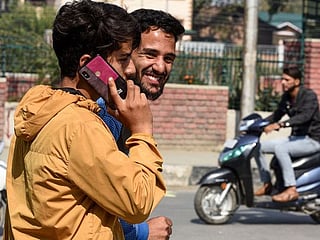 In pictures: India partially restores mobile phone lines in Kashmir 