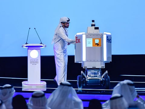 Roxo, a robot used by FedEx in the US, delivers the winners list to the announcer at Dubai World Challenge for Self-Driving Transport 2019 at Dubai World Trade Centre on Tuesday. Roxo will be trailed for the first time outside the US for door-to-door delivery in Dubai under an agreement with the RTA. Photo: Ahmed Ramzan/ Gulf News