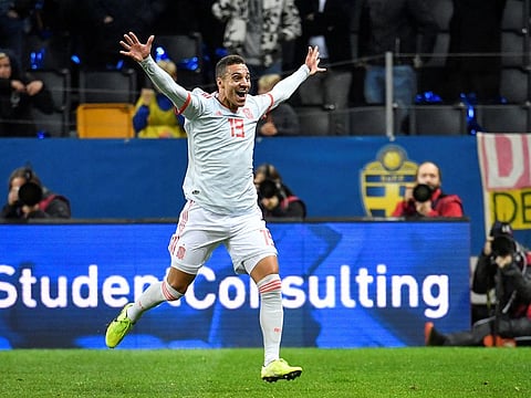 Spain's Rodrigo celebrates after scoring.