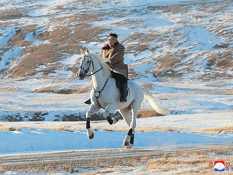 North Korean leader Kim Jong Un rides a horse during snowfall in Mount Paektu in this image released by North Korea's Korean Central News Agency (KCNA) on October 16, 2019.