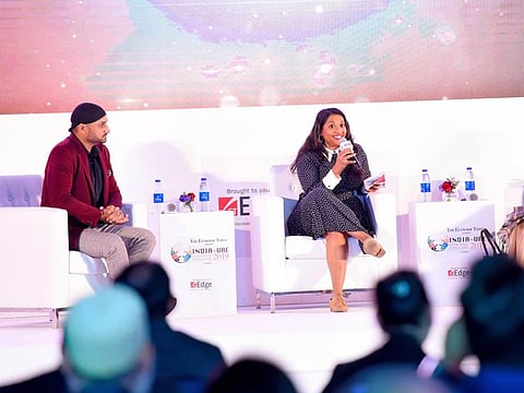 Manjusha Radhakrishnan moderating a session with Harbhajan singh and Sunita Kohli. Photo: Virendra Saklani/Gulf News