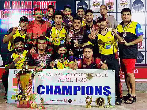 The victorious Gulfgate Warriors team pose with the trophy