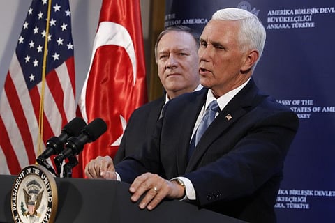 Vice President Mike Pence and Secretary of State Mike Pompeo hold a news conference at the Ambassador's residence after meeting with Turkish President Recep Tayyip Erdogan at the Presidential Palace, Thursday, Oct. 17, 2019, in Ankara, Turkey. 