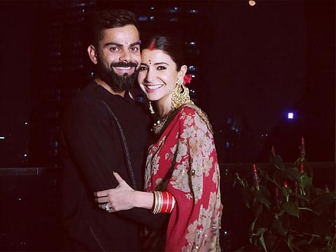Taking to Twitter, Kohli on Thursday shared an image of him with Anushka with a caption: "The ones who fast together laugh together."