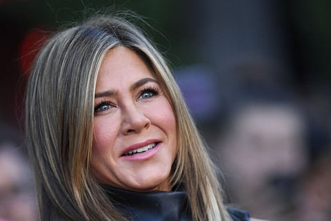 Jennifer Aniston arrives to attend the Los Angeles premiere screening of the Netflix film "Murder Mystery" at the Regency Village Theatre in Los Angeles.