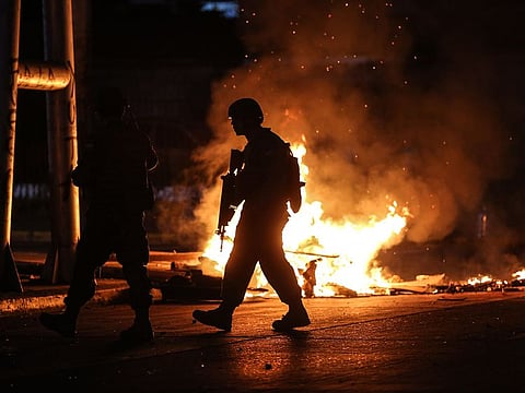 Soldiers patrol the streets of Concepcion, Chile, on October 20, 2019, during protests.