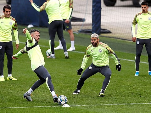 Manchester City's Nicolas Otamendi and Sergio Aguero during training.