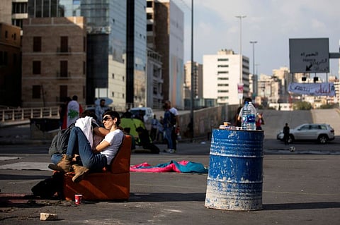 Demonstrators block a highway during ongoing anti-government protests in downtown Beirut, Lebanon, October 28, 2019. 