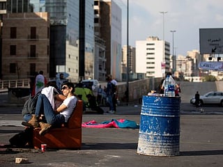 Lebanon protesters block roads to keep revolt alive
