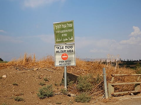 The border sign in the Naharayim park on Israel-Jordan border, Monday, Oct. 21, 2019. 