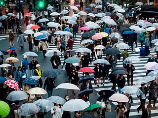In pictures: People at world's busiest pedestrian crossing, in Japan