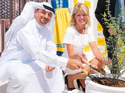 Najeeb Mohammed Al-Ali, Executive Director, Expo 2020 Dubai Bureau, with Anna Hallberg, Sweden’s Minister for Foreign Trade, during the tree planting ceremony at the Expo 2020 site