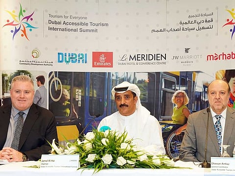 Jamal Al Hai (centre) addressing a press conference in Dubai to announce details about the Dubai Accessible Tourism International Summit 