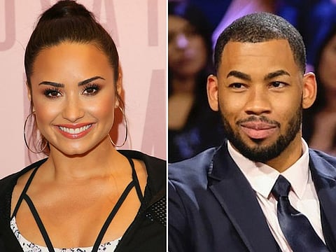 Demi Lovato; Mike Johnson

AFP