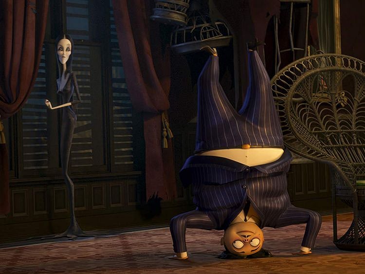 Charlize Theron and Oscar Isaac in The Addams Family-1572499367616