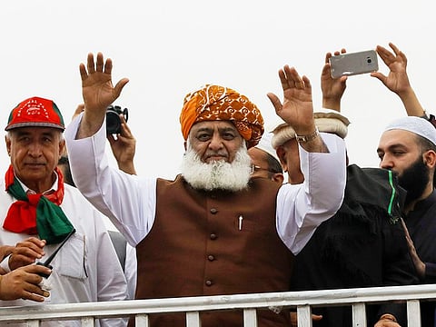 Fazal Ur Rehman, President of the Jamiat Ulema-e-Islam-Fazal (JUI-F) waves to supporters during what participants call Azadi March (Freedom March) to protest the government of Prime Minister Imran Khan, in Islamabad, Pakistan November 1, 2019. 