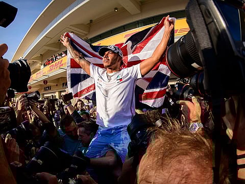 Lewis Hamilton celebrates winning his sixth world championship.