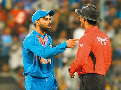 Indian skipper Virat Kohli argues with umpire during a T20 match against South Africa in September.