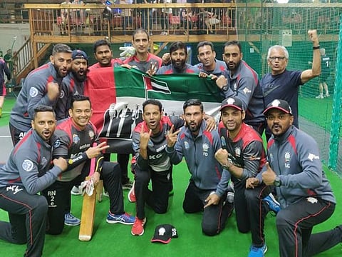 The UAE Indoor Cricket team celebrate.