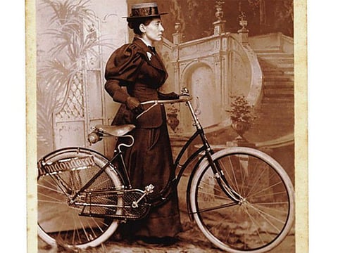 An image in the public domain shows a cabinet card of Annie Kopchovsky, better known as Annie Londonderry, who set out in her early 20s to bicycle around the world. Kopchovsky, a Latvian immigrant who in June 1894, at about age 23, cycled away from her Boston home, leaving a husband and three small children, for a journey around the world that came to symbolize women’s independence. She died of a stroke on Nov. 11, 1947. 