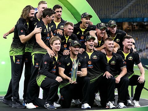 Australia players celebrate their victory in the Twenty20 cricket series against Pakistan at Optus Stadium in Perth on November 8, 2019. 