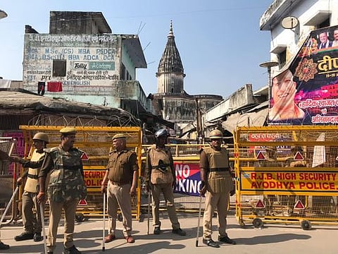 A security personel walks in front of the Indian Supreme court in New Delhi on August 27, 2014.
India’s top court said lawmakers with criminal backgrounds should not serve in government,