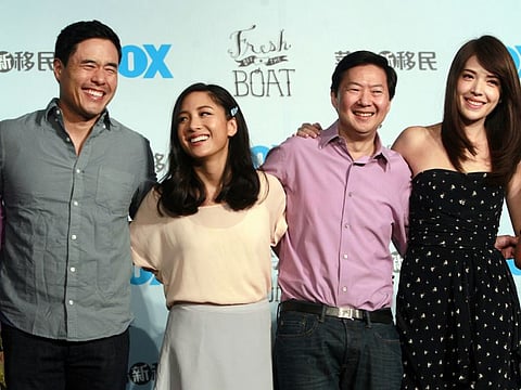 FILE - In this Aug. 5, 2016 file photo, Randall Park, from left, Constance Wu, Ken Jeong and Ann Hsu pose for photographers during a media event announcing their comedy series "Fresh off the Boat" in Taipei, Taiwan.