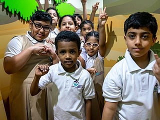Children tackle riddle maze at Sharjah book fair