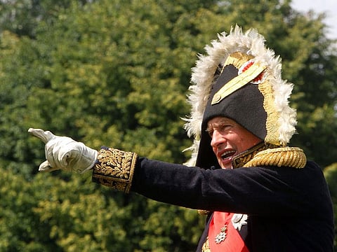 This file photo taken on June 23, 2012 shows Paris Sorbonne University's professor Oleg Sokolov giving orders to his troops, on the banks of the river Neman in Kaunas, central Lithuania, as he plays Napoleon Bonaparte.