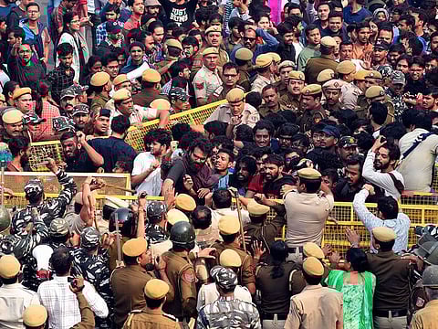 Students of Jawaharlal Nehru University (JNU) clash with police as they demand to withdrawal the draft hostel manual, in New Delhi on November 11, 2019. 
