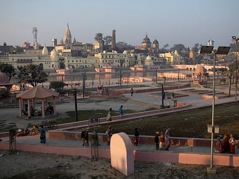 Hindu devotees leave after praying on the banks of Sarayu river after Supreme Court's verdict on a disputed religious site, in Ayodhya, India, November 11, 2019