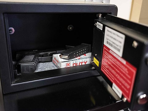 Guns in a finger print activated safe is placed in designated classrooms around Sidney High School school in case of an active shooter