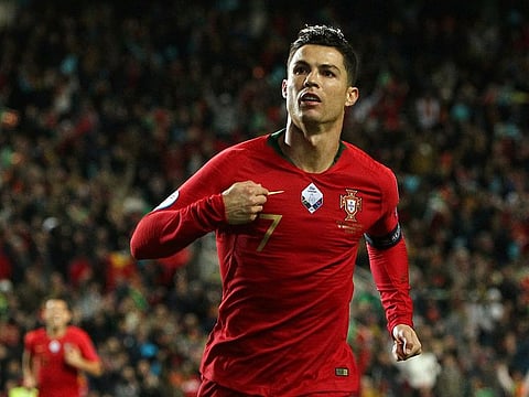 Portugal's Cristiano Ronaldo celebrates scoring their second goal.