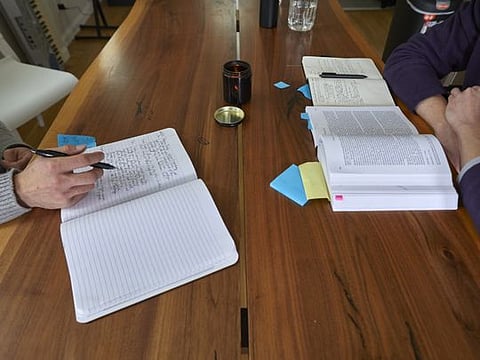 James Sinka and Andrew Fleischer, quietly writing and reading while on a dopamine fast, in their apartment in San Francisco on Oct. 16, 2019. 
