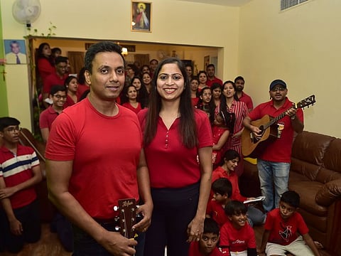 Rajiv David (left) and Jessica David practice Carol singing with The Jingles at their home in Dubai on 9th November, 2019. Photo Clint Egbert/Gulf News