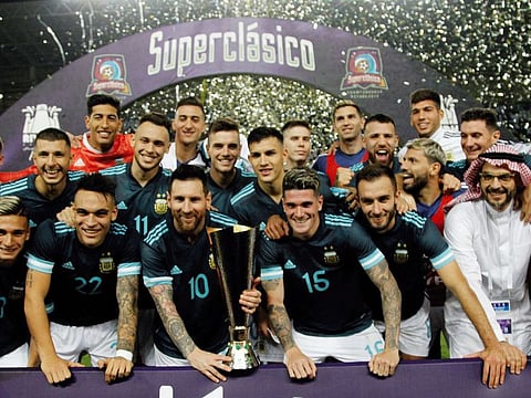 Lionel Messi and his Argentina teammates celebrate their 1-0 win over arch rivals Brazil on Friday night.