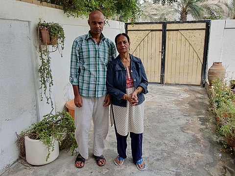 Mary Sardar and Staffard in the compound of their current home - a converted garage of a villa in Sharjah