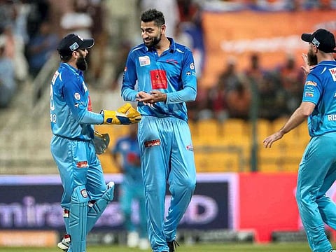 UAE skipper Ahmad Raza (centre) is lauded by Karnataka Tuskers teammates for his match winning bowling performance on Saturday. 