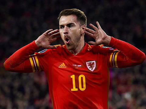 Wales' Aaron Ramsey celebrates scoring their first goal.