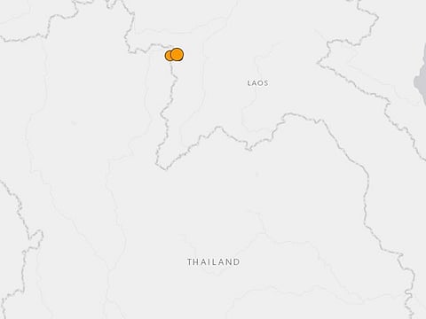A USGS map shows the location of the earthquake, on the border between Thailand and Laos.