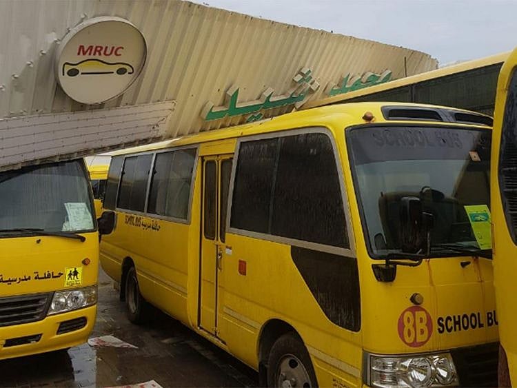 Ajman Police damaged buses