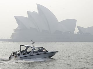 Smoke blankets Sydney as wildfires spread across Australia
