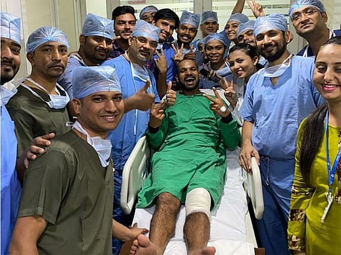 Shikar Dhawan shared pictures with the hospital staff and captioned the post as: "We Fall, We Break, but then ... We Rise. 