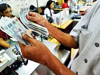 Remit now? UAE expats gain on rupee, peso