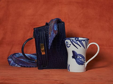 A Hermes Kelly Sellier II and a Pablo Picasso pitcher.Source: RealReal